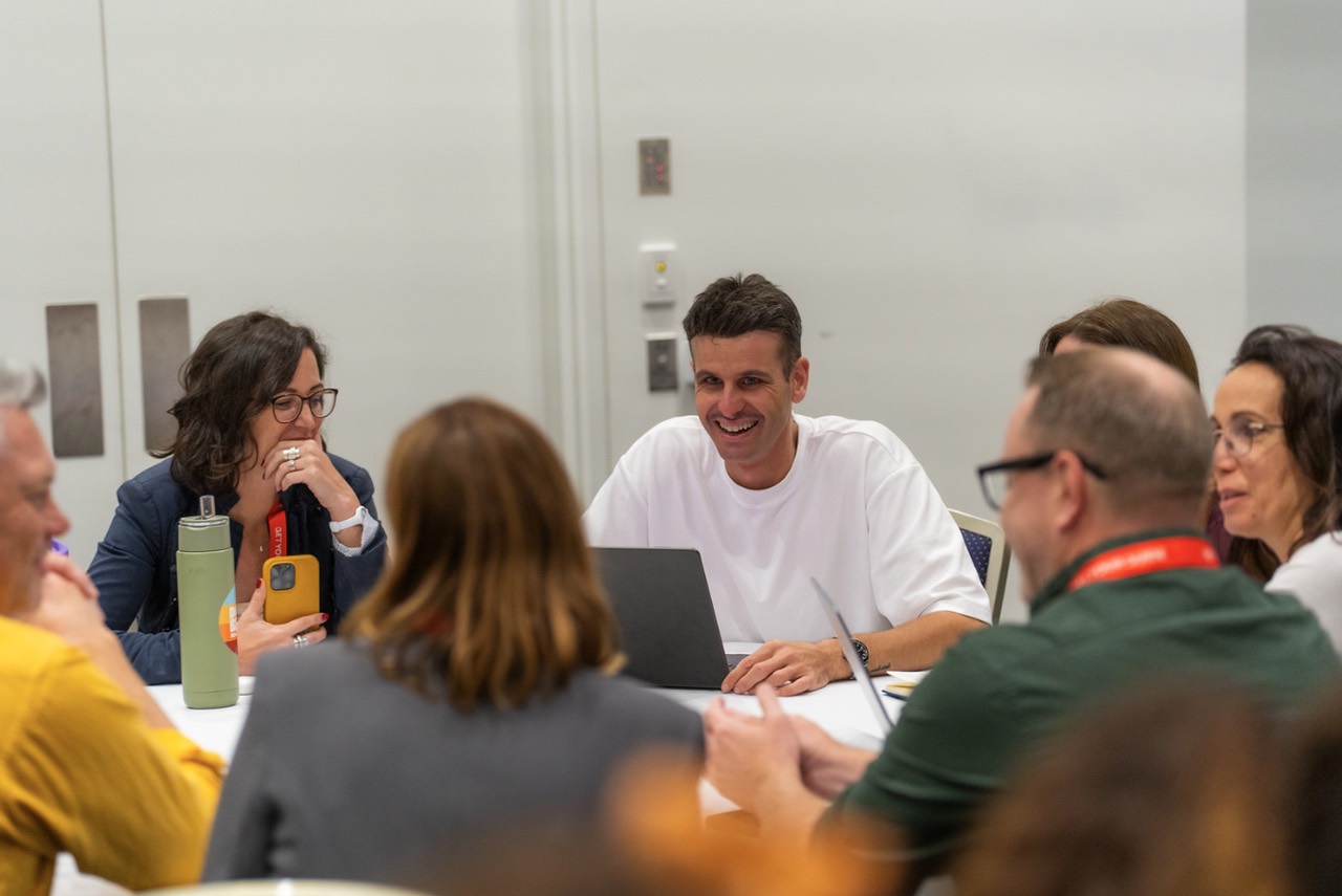 Oliver Green running a hands-on workshop with a group of operators