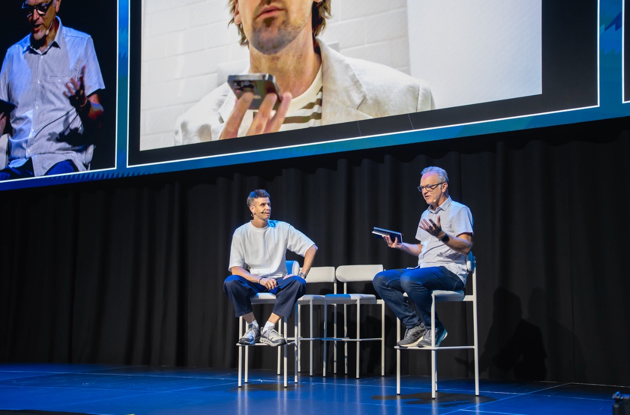 Oliver Green in a fireside chat about AI tools on the Arival stage